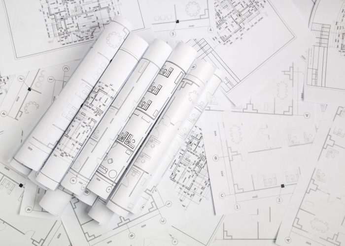 Paper,Architectural,Drawings,And,Blueprint
